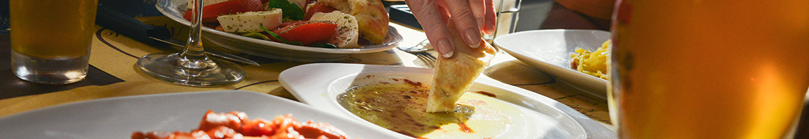 Eating Cafe at Meldgie's Rivers Edge Cafe restaurant in Wakefield, RI.